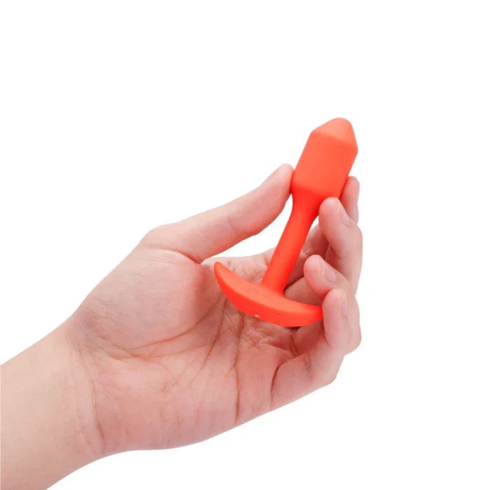 b-Vibe Snug Plug 1 Weighted and Vibrating Silicone Butt Plug - Orange - Image 3